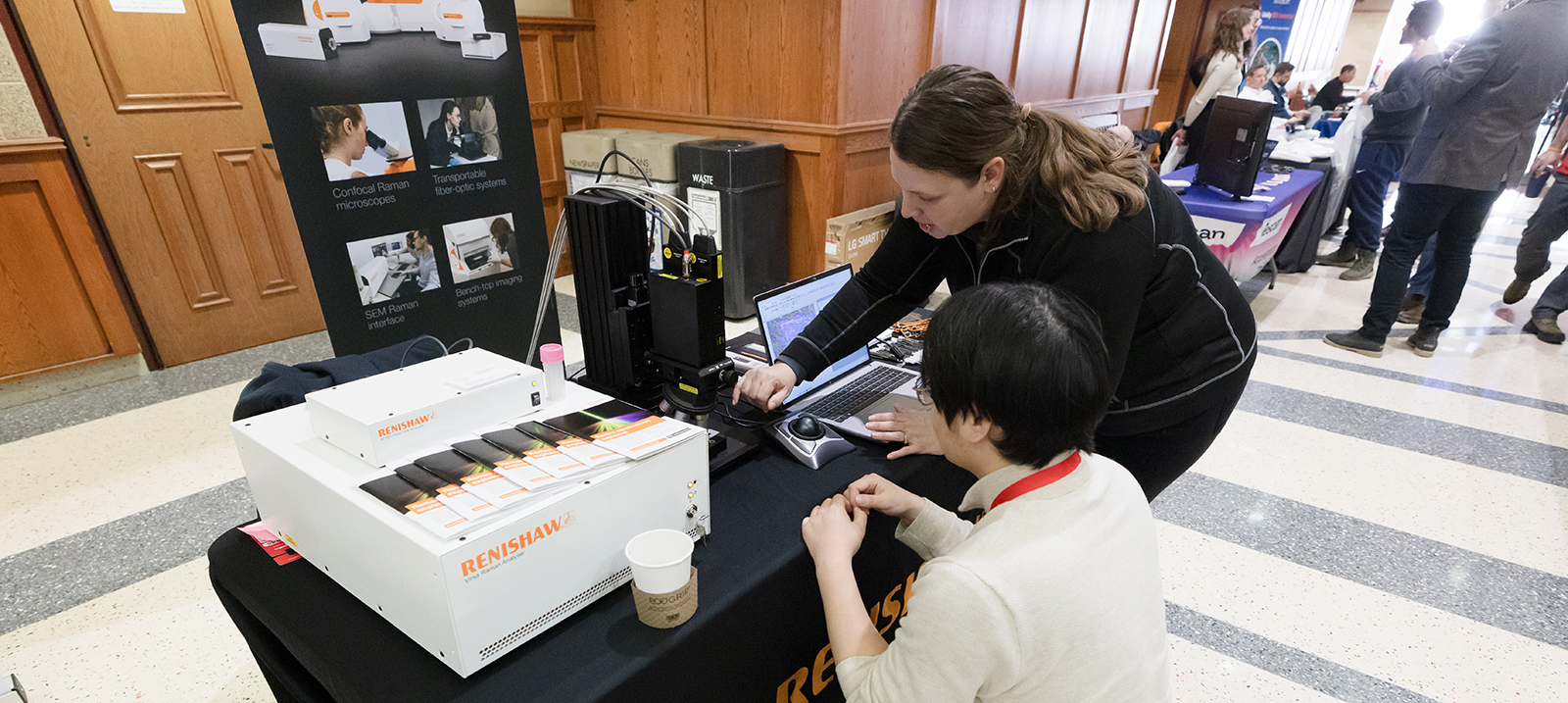 A vendor demonstrates instrument features at the UW–Madison Facilities Day 2026 event