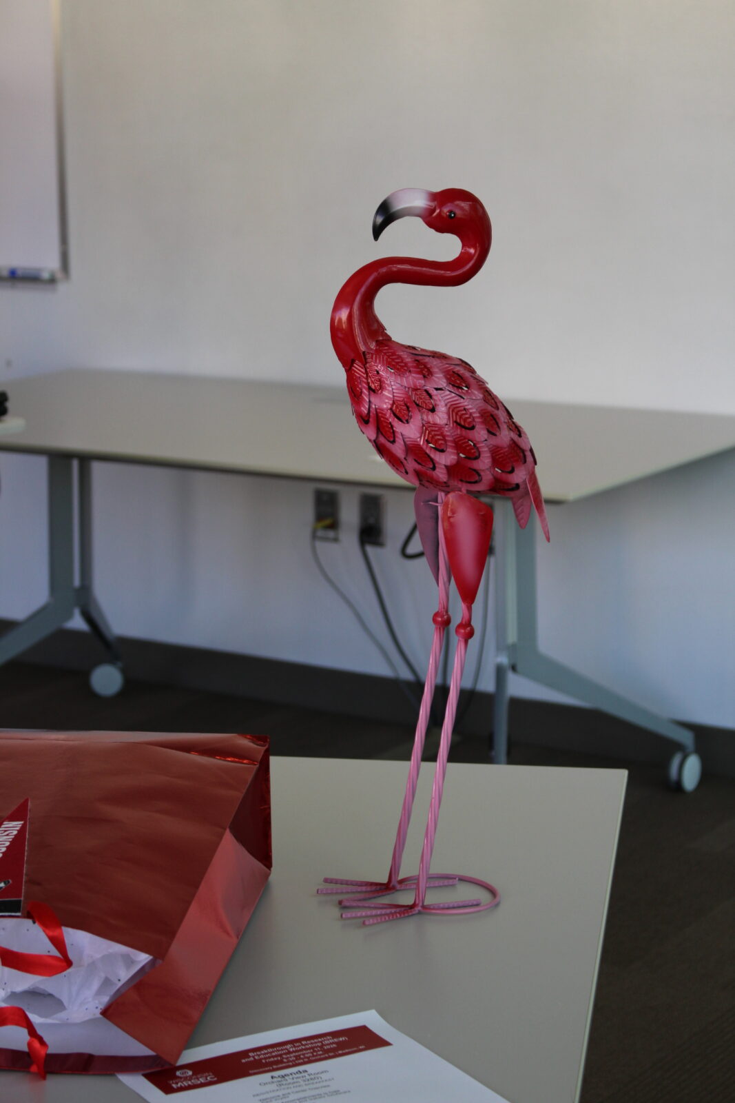 Statue of a pink flamingo.